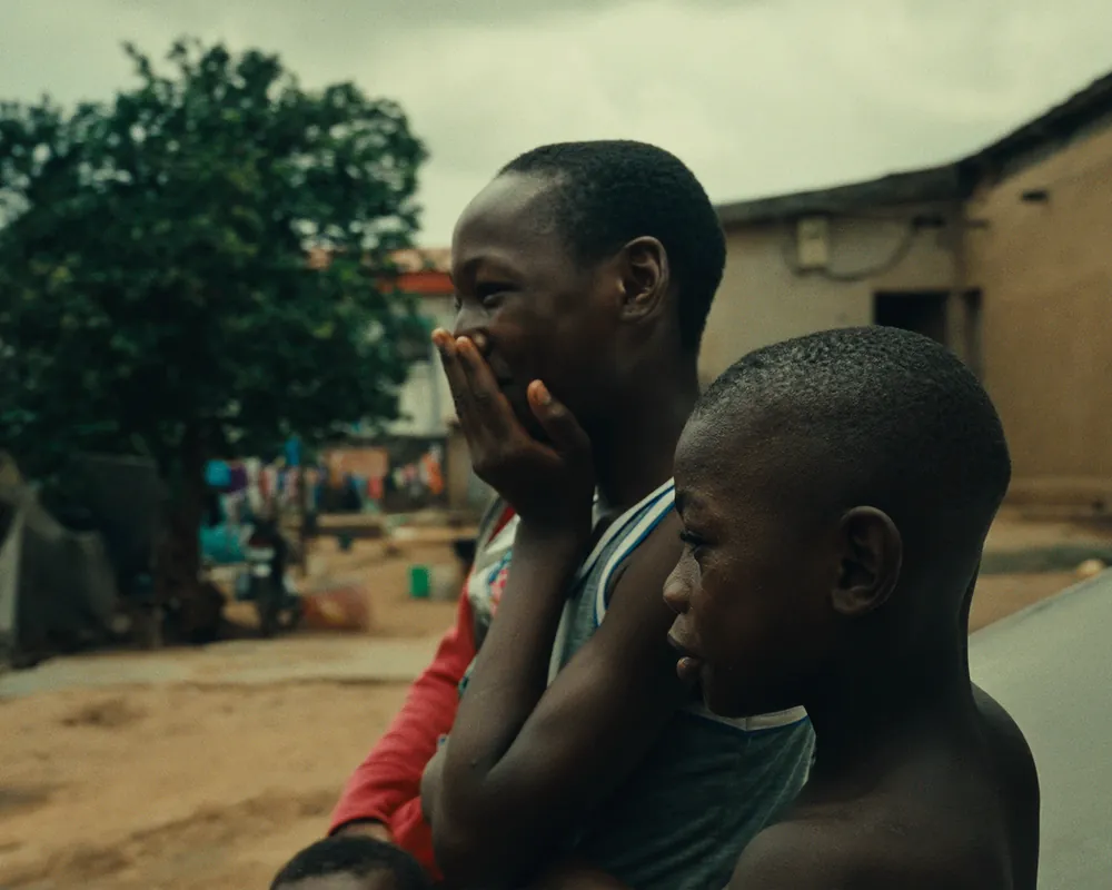 Lagos neighbourhood portrait focused on identity and emotional observation